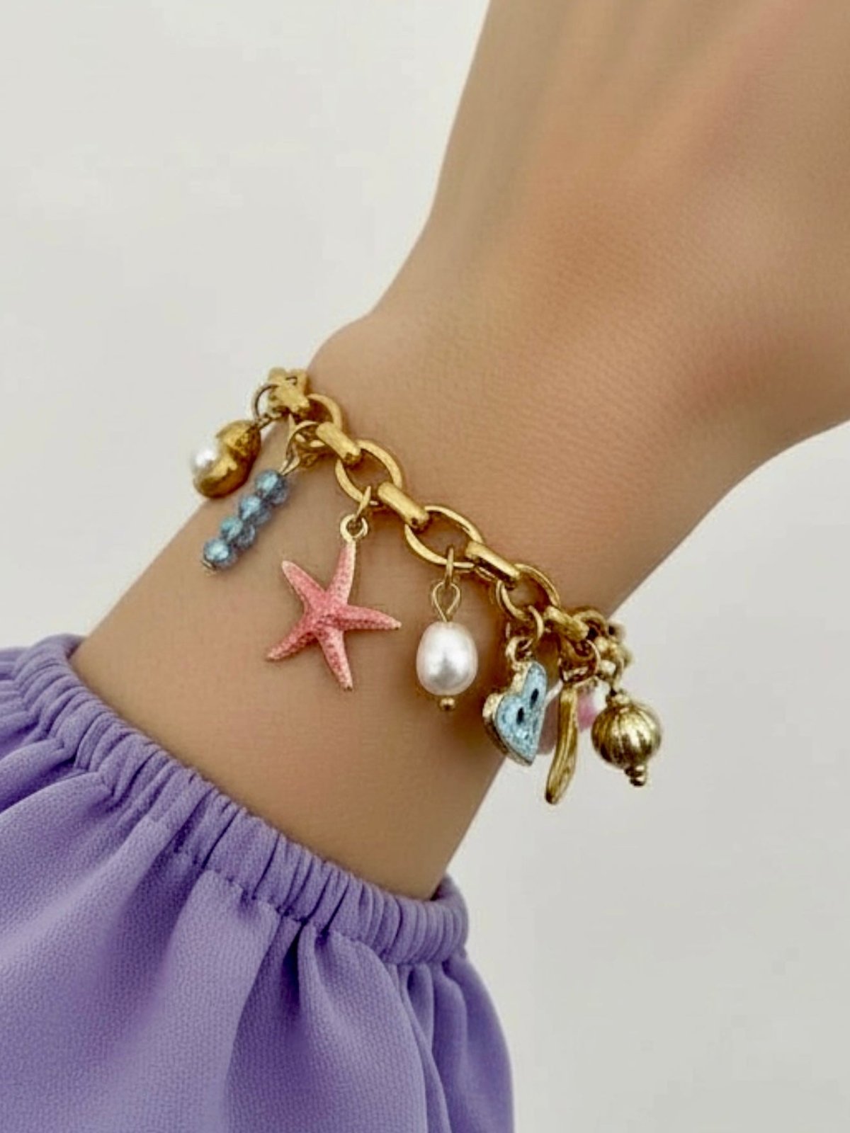 Charm Avenue Pirouette charm bracelet - 18k gold plated - Shop women's at Charm Avenue